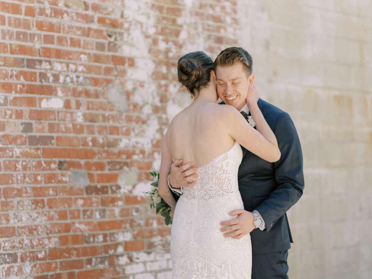 Bride and Groom first look at Strongwater Events from an early spring in downtown Columbus, Ohio with Kelly & Sean