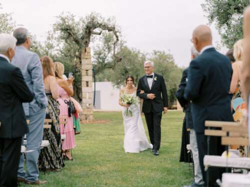 Wedding ceremony in an olive grove from a Masseria Parco della Grava wedding in Puglia, Italy