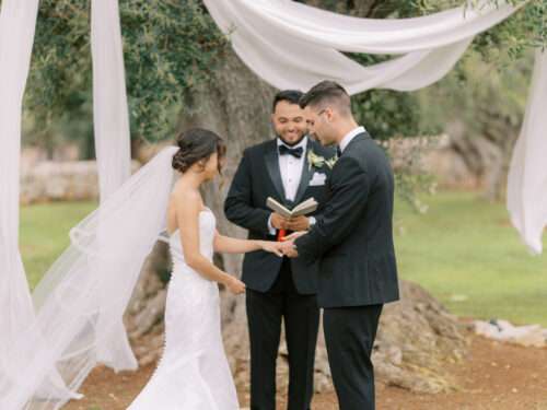 Wedding ceremony in an olive grove from a Masseria Parco della Grava wedding in Puglia, Italy