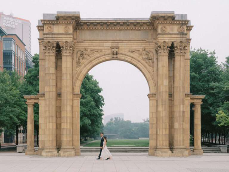 Chic and moody downtown Columbus engagement photos at McFerson Commons Park in the Arena District with Ana and Stephen