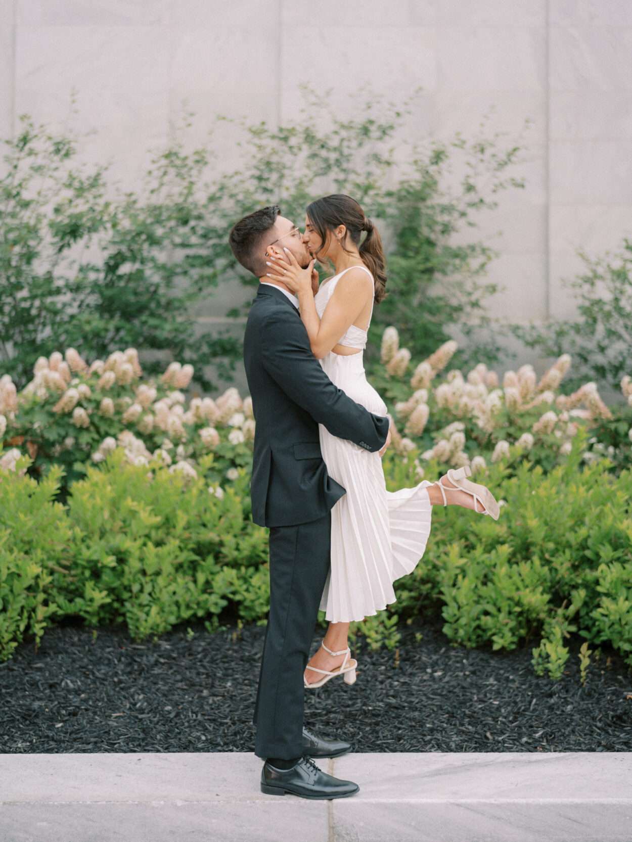 Chic and moody downtown Columbus engagement photos near Scioto Mile Park with Ana and Stephen