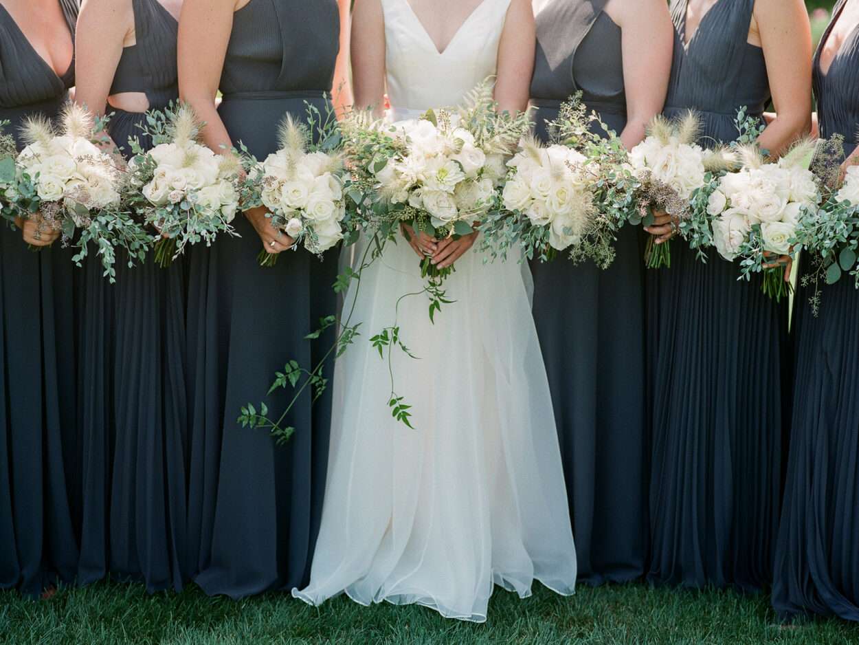 Bridesmaids portraits at Kirtland Country Club from an August wedding