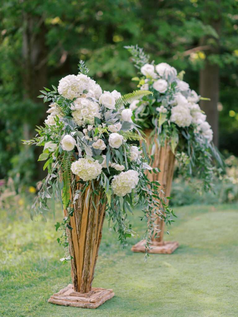 An outdoor wedding ceremony on the tenth green at Kirtland Country Club