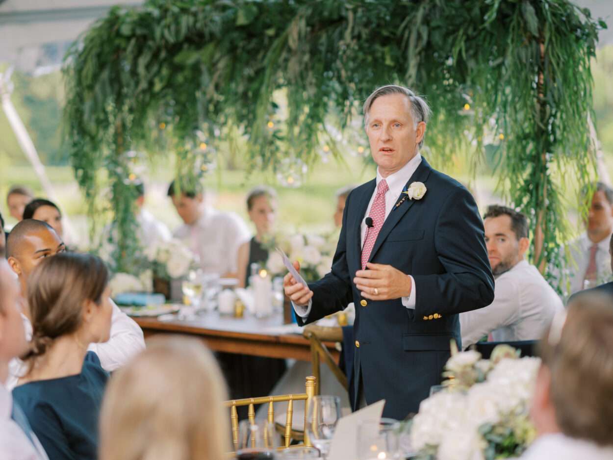 A tented wedding reception at Kirtland Country Club