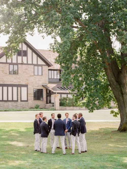 Groomsmen portraits from an August wedding at Kirtland Country Club