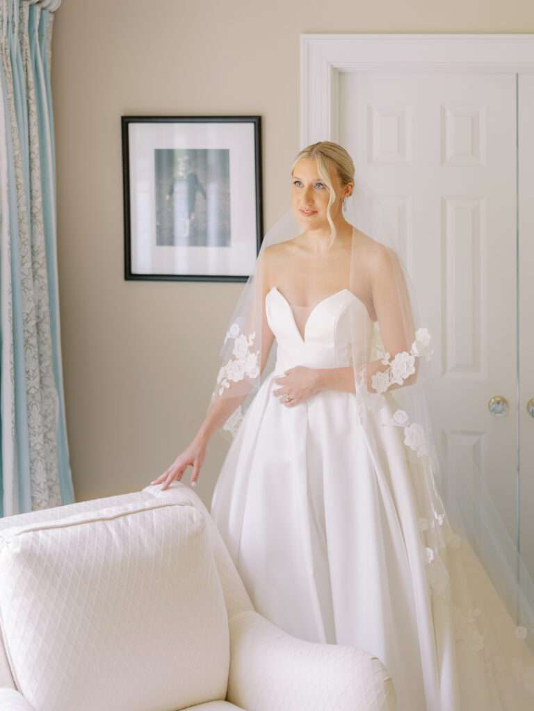 Bridal portrait with wedding dress and veil detail from a Cleveland wedding at The Country Club