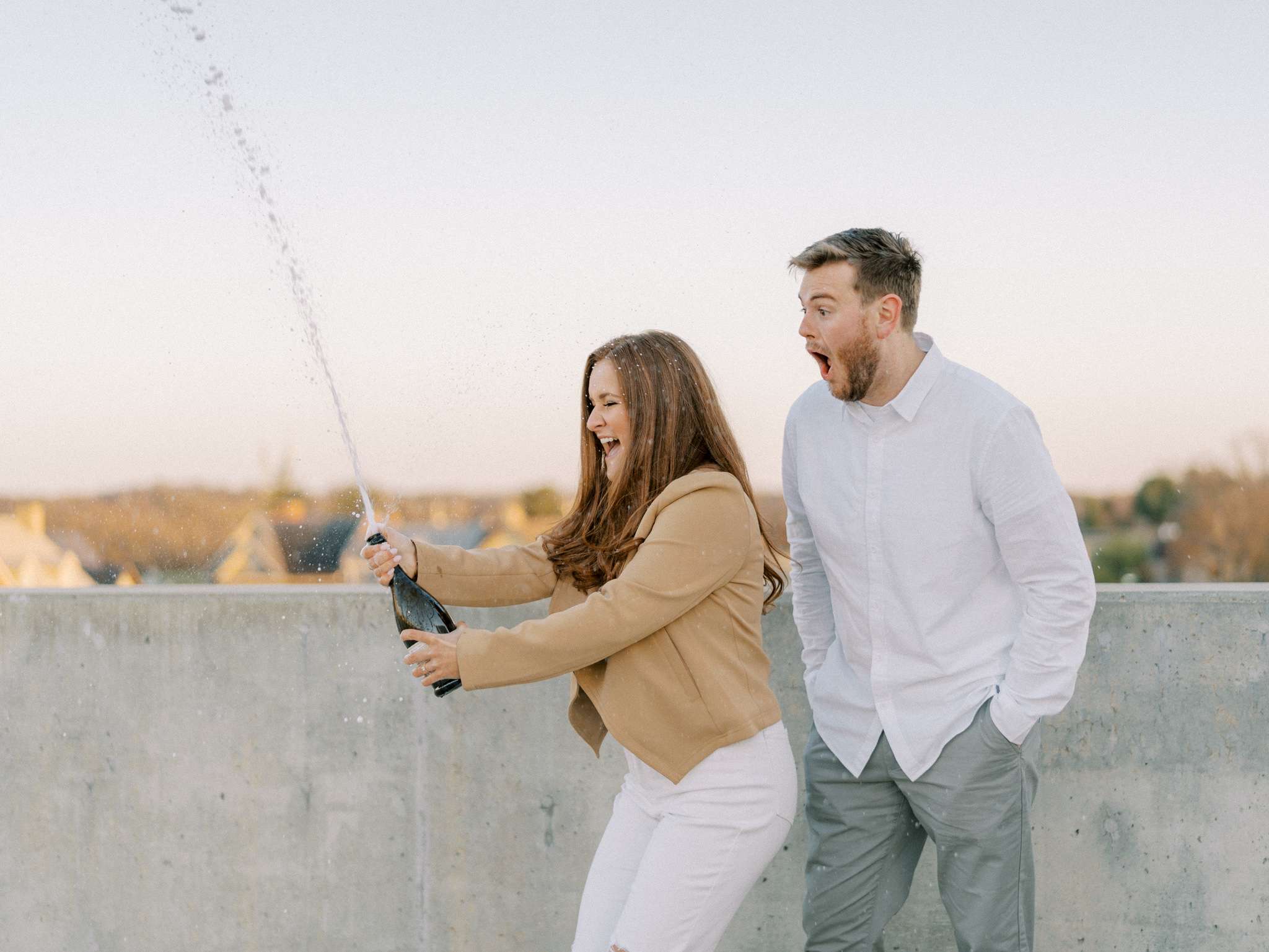 Bridge Park engagement photos near Dublin, Ohio in early spring with Marybeth and Spencer