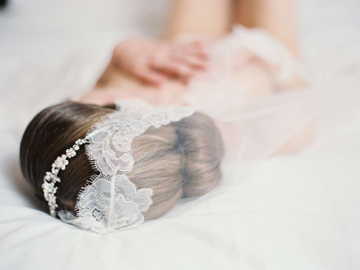 Bridal boudoir photography editorial captured on film featuring the theme white bride/black boudoir by Columbus wedding photographer Hunter Photographic