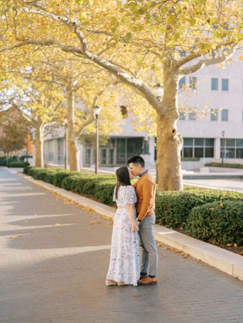 Park of Roses engagement photos in Columbus, Ohio at the peak of fall color with Emily and Sam