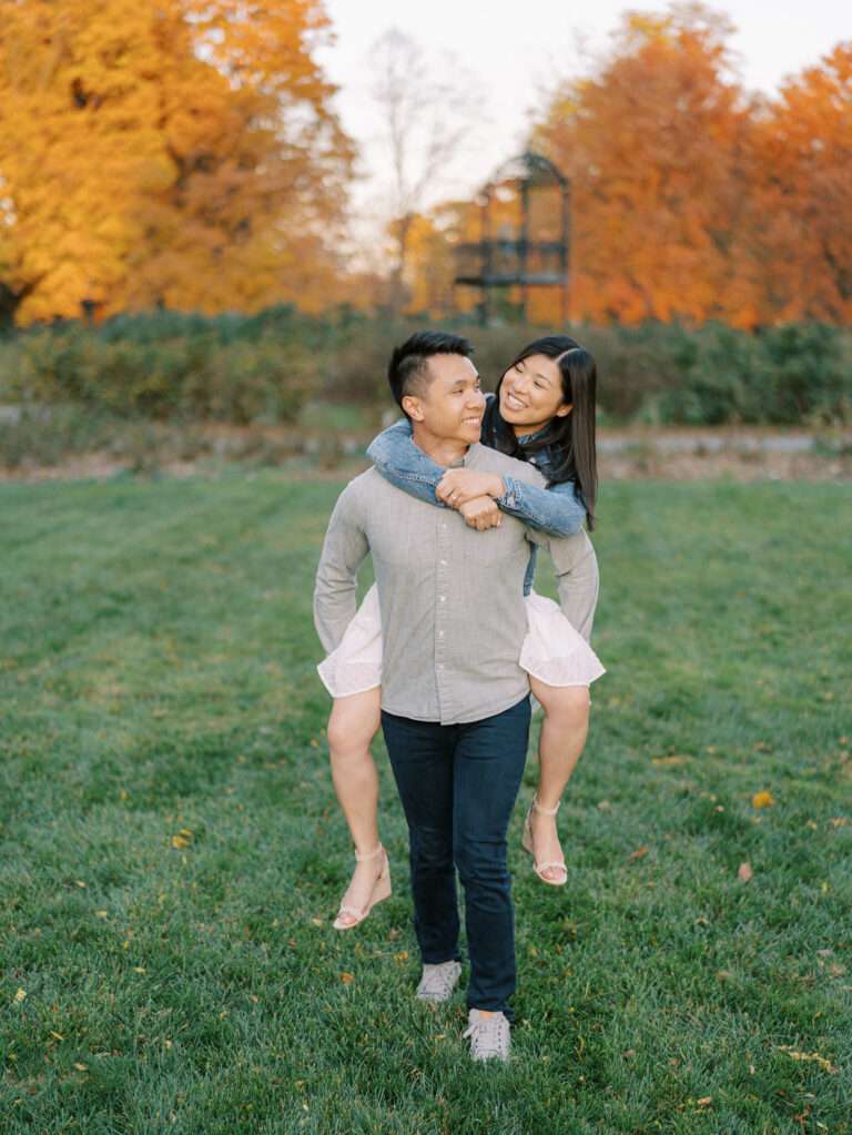 Park of Roses engagement photos in Columbus, Ohio at the peak of fall color with Emily and Sam